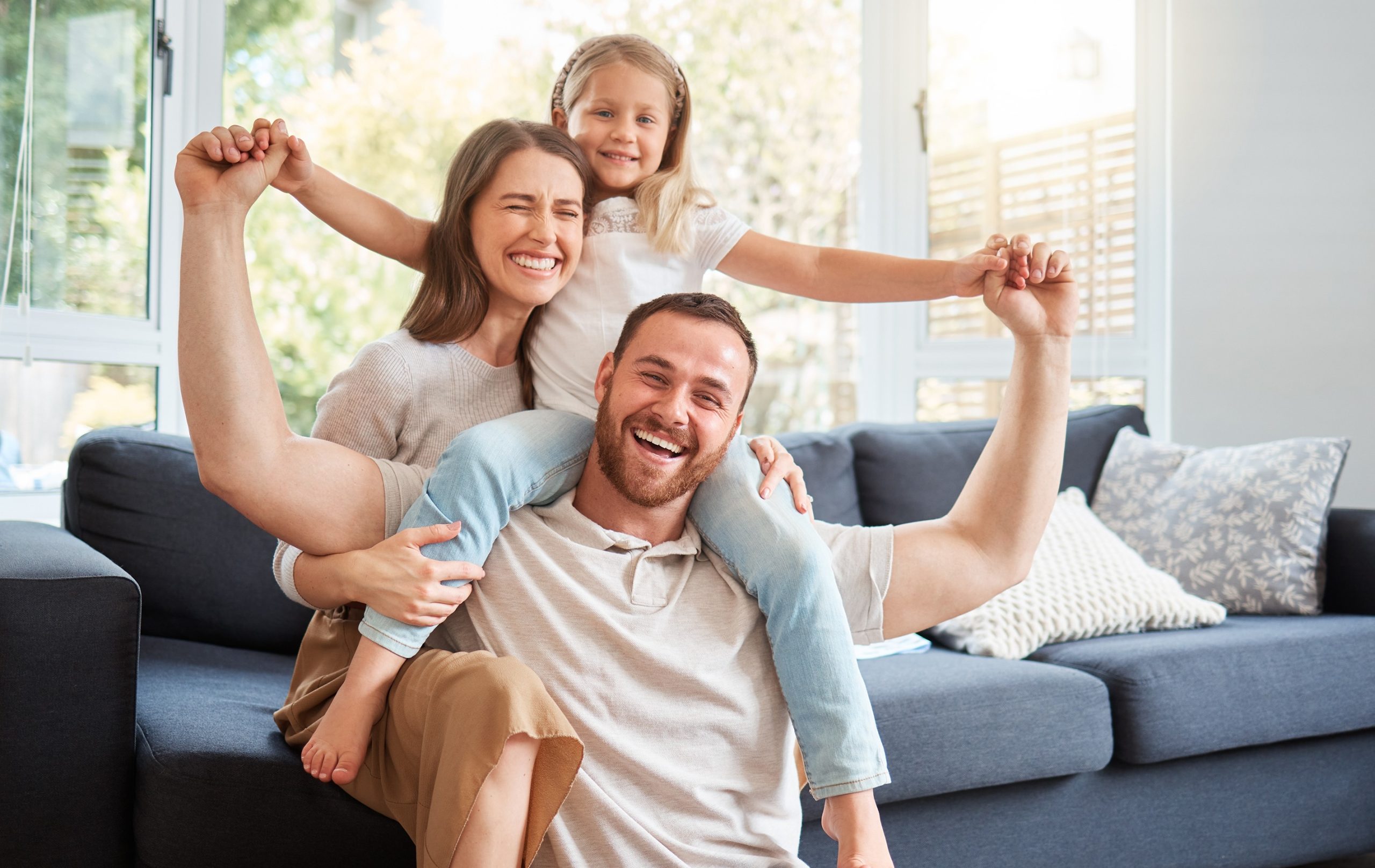 Smiling family at home enjoying fresh clean indoor air in Annapolis