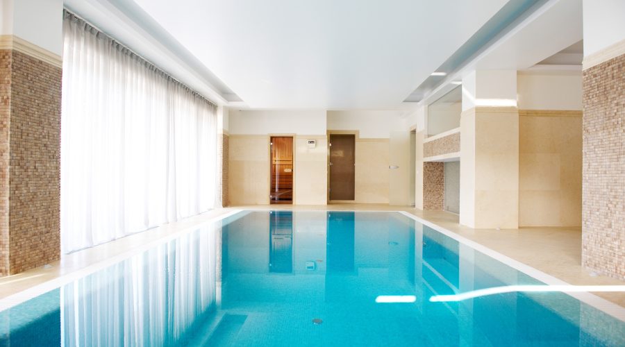 Modern indoor swimming pool with controlled humidity and professional dehumidification environment